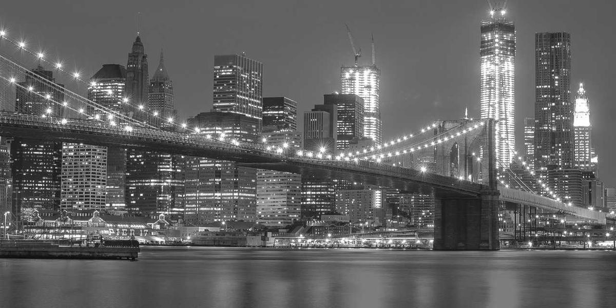 Man following a proper grooming routine in a modern bathroom
